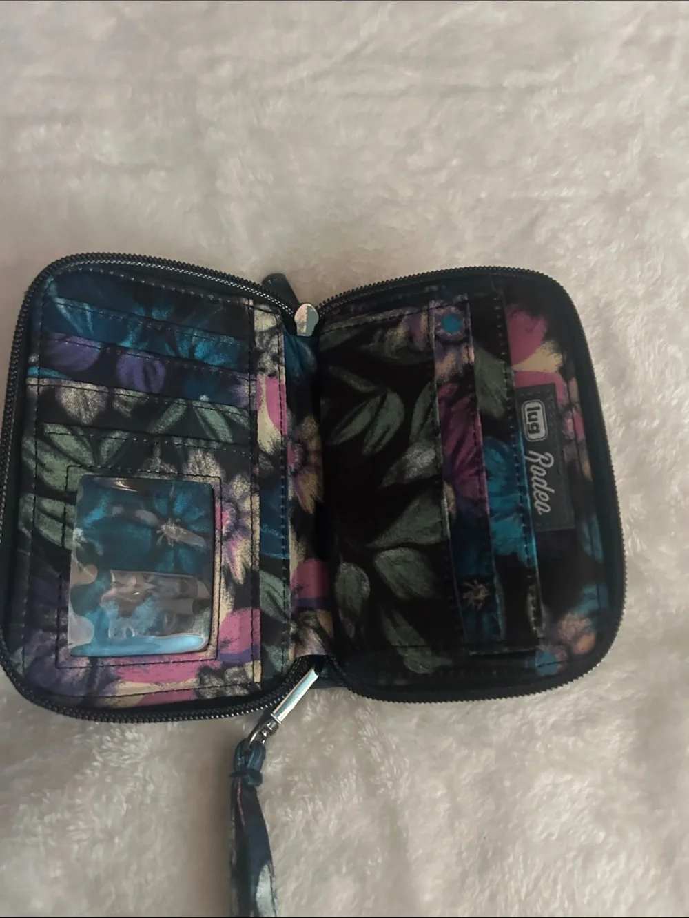 lug Quilted Floral Wristlet in Black with Multicolor Floral Accents